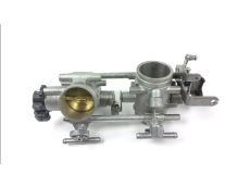 Corps d'injection gauche
