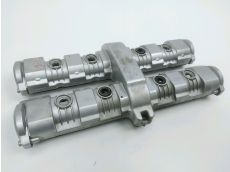 Cache culbuteur
