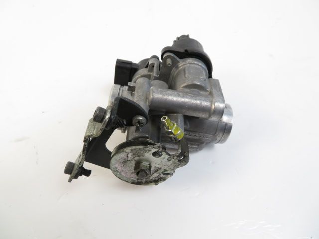 Corps d'injection gauche occasion YAMAHA YBR 125 2008