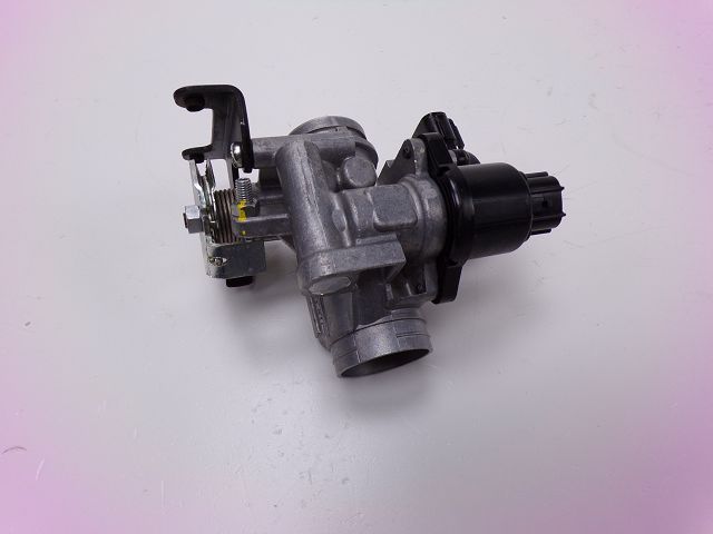 Corps d'injection gauche occasion MBK EVOLIS 125 2017