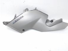 Cache lateral gauche