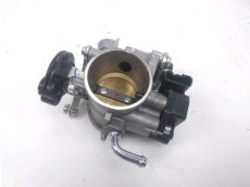 Corps d'injection gauche