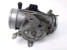 Corps d'injection gauche