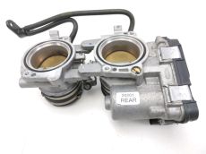 Corps d'injection gauche