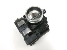 Corps d'injection gauche