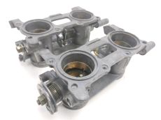 Corps d'injection gauche